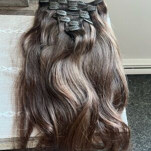 Clip in human hair extensions